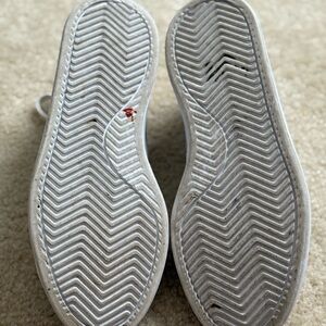 Women’s white adidas, size 8. Worn approximately 5 times, good condition.